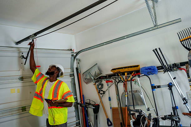 Professional Garage Door technician working in Goodman, MO